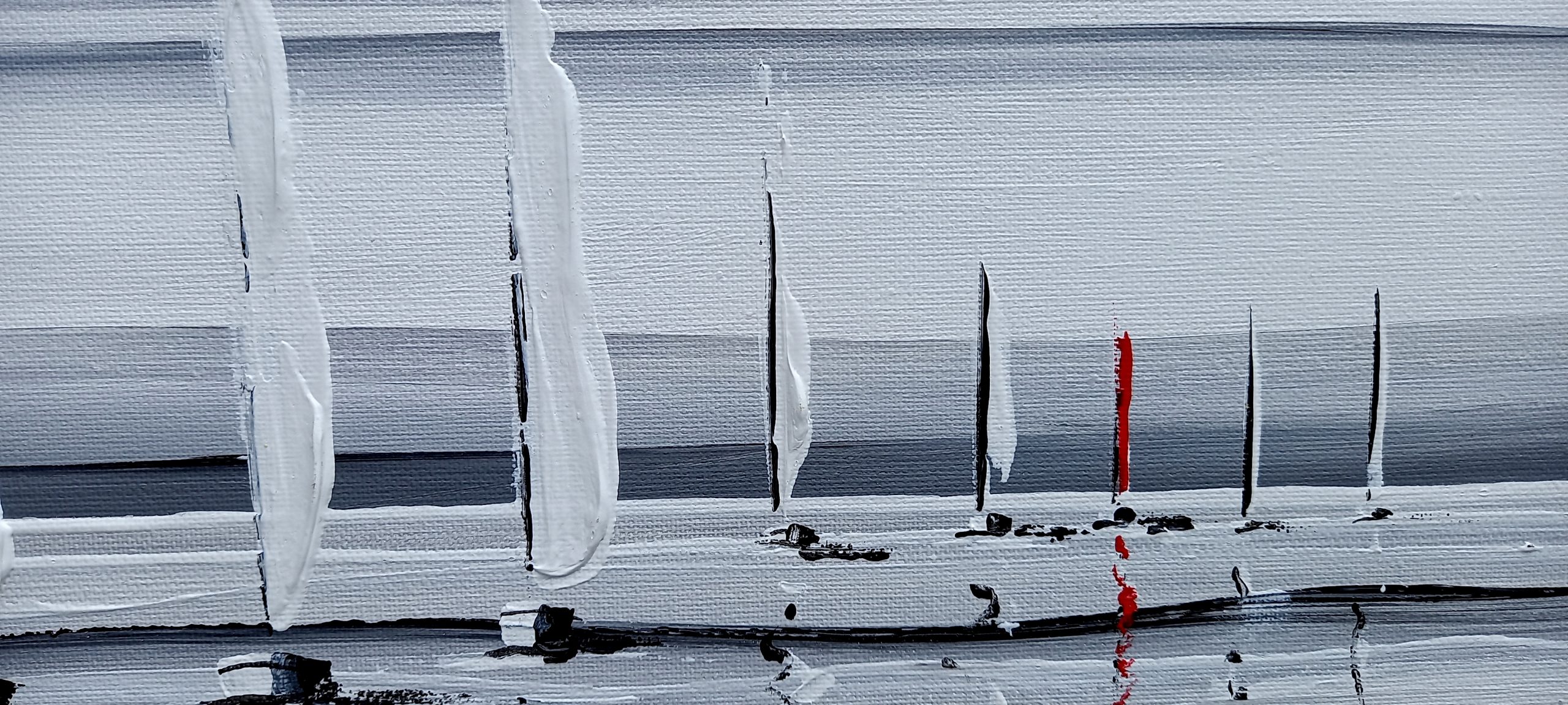 voilier blanc avec leurs voiles blanches a l'horizon