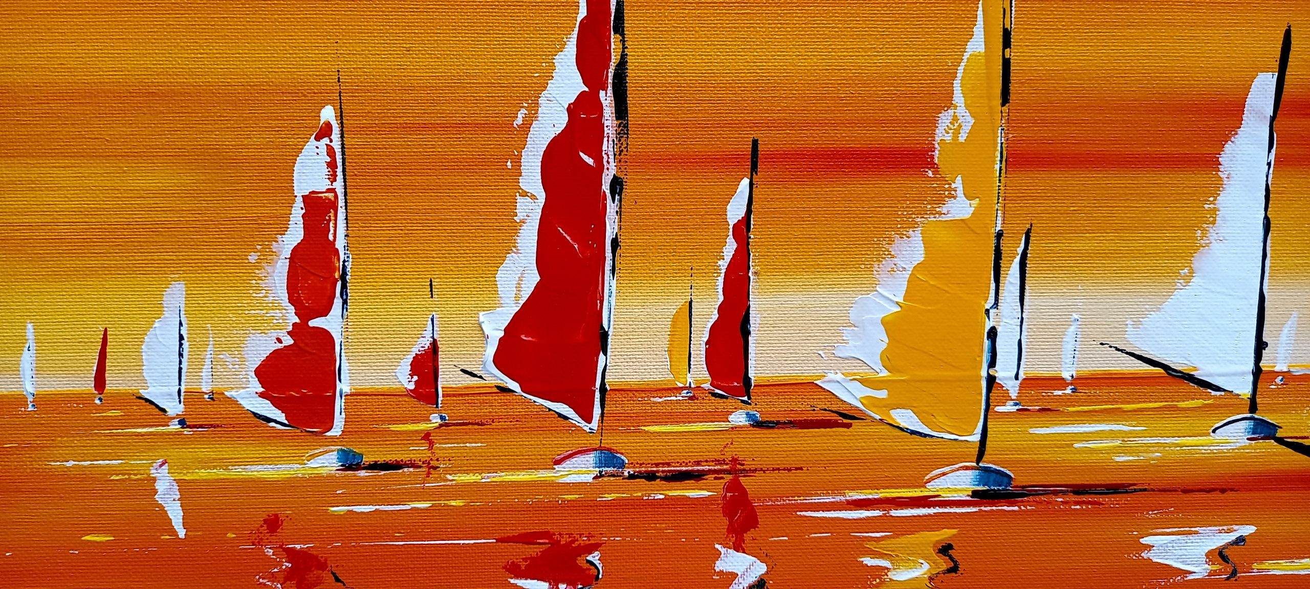 bateaux avançant vers la côte poussé par le vent 