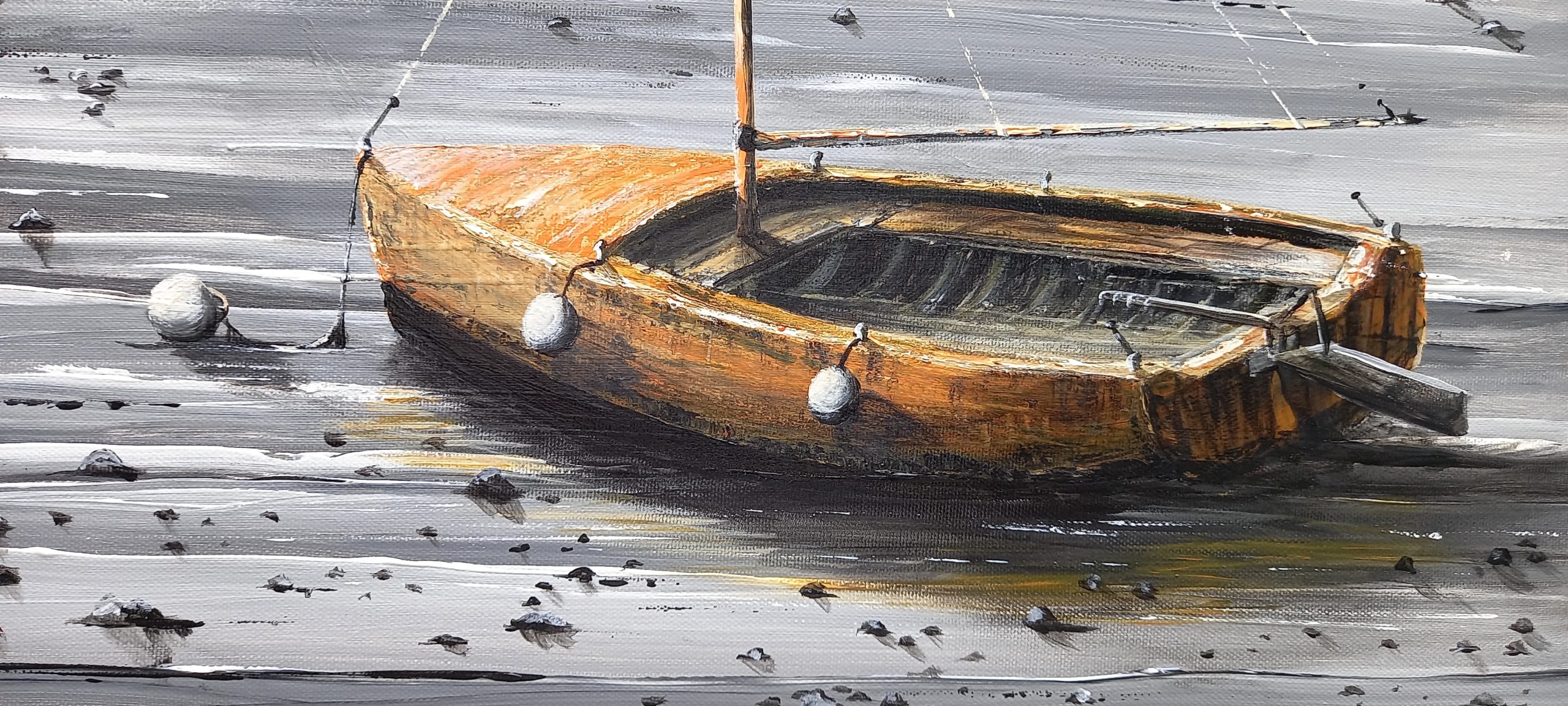 plan détaillé du voilier orange posé sur le sable